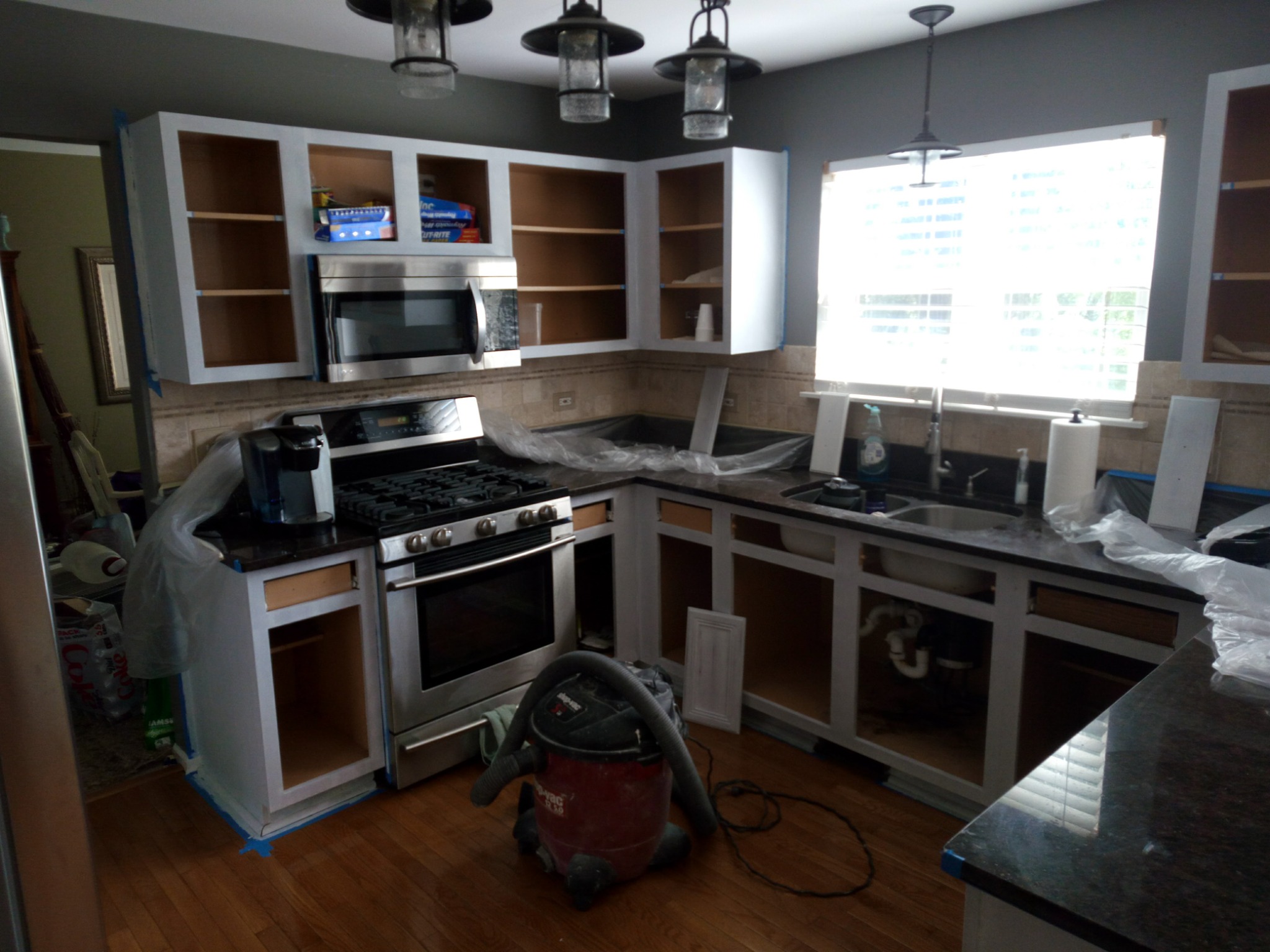 Cabinet doors during refinishing process