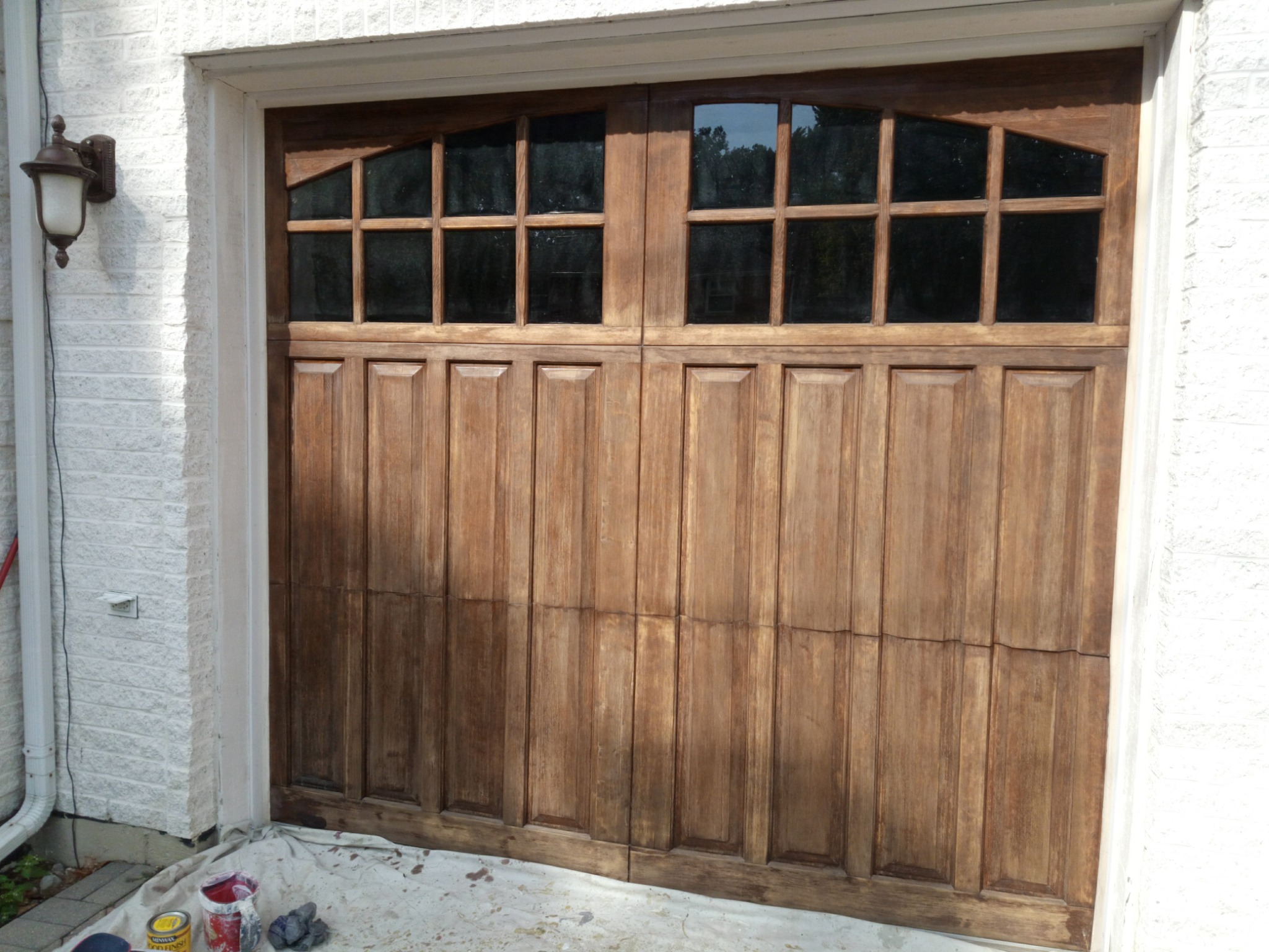 Wood garage door before refinishing